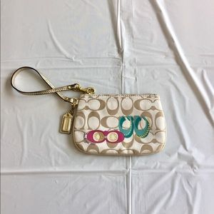 Gold original coach wristlet